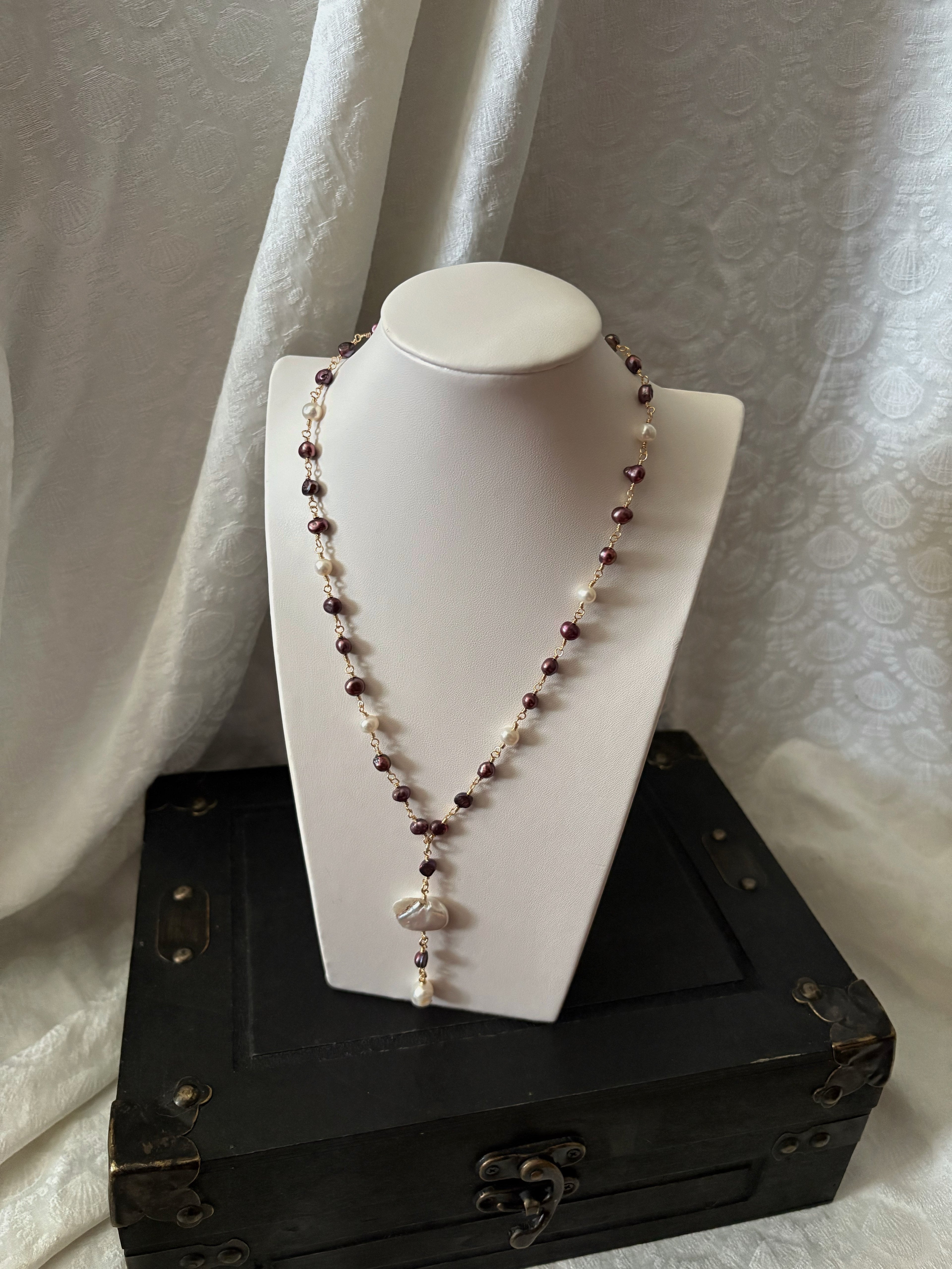 A Secret Pirate Necklace in Purple